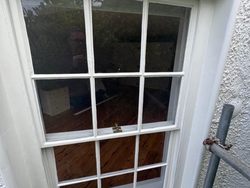 Restored timber sash window on period property by Lees Builders Ltd