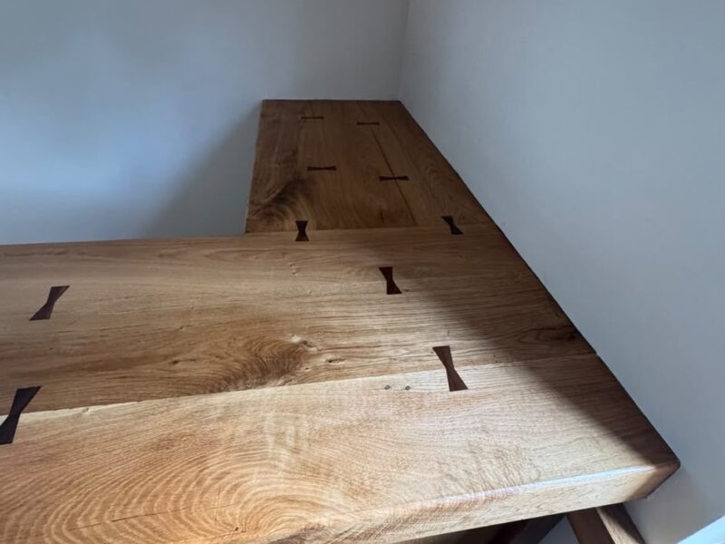 Solid oak bar worktop with butterfly joints at the Hutton project